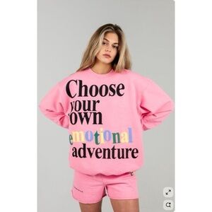 Pink Graphic Crewneck Sweatshirt with 'Choose Your Own Emotional Adventure'